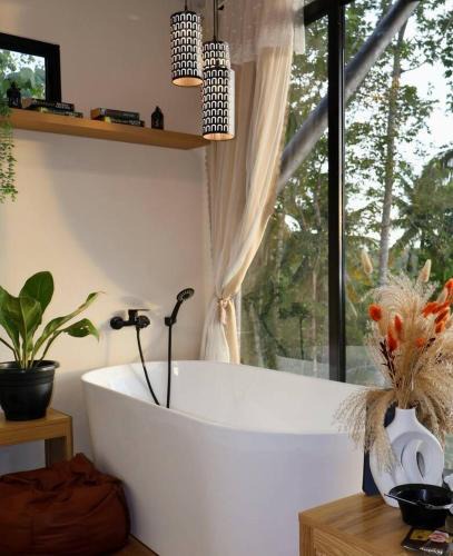 Samal House | 15 mins from barge with tub + wifi (glass cabin)