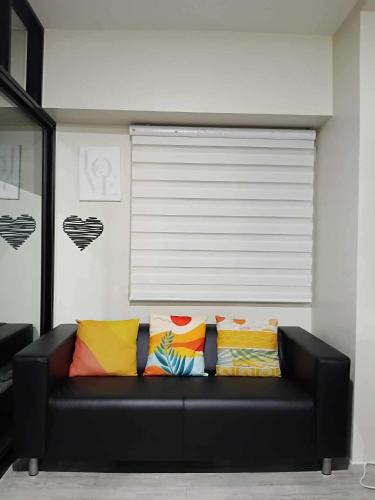 CSJDM Apartment | 2 BEDROOM CONDO close to SM Tungko BULACAN ideal for Family Queen bed on Bedroom 1 accessible to Bedroom 2 with sliding doors Free Wifi & Netflix to watch in a comfy sofa & twin bed Access to SWIMMING POOL entry is very affordable and kids get for free