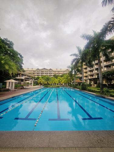 Taguig Apartment | 2 bedroom resort type free parking Wifi Netflix