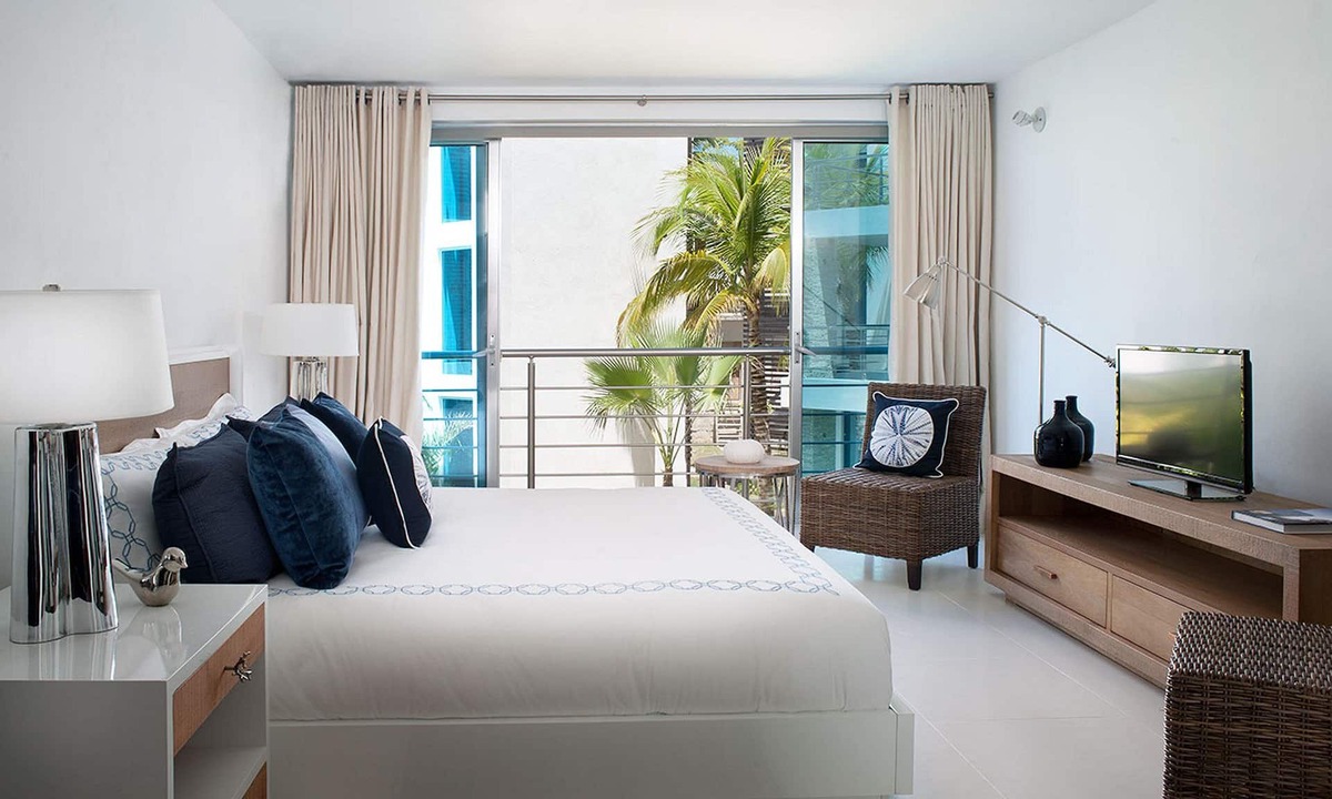 El Batey Apartment | 4BD groundfloor condo, pure beachfront, gym/pool/high-speed internet/cable TV
