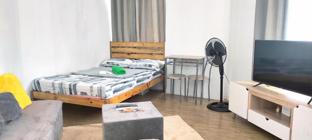 Muntinlupa Apartment | Alabang Staycation near Airport (NAIA)