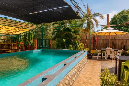 San Pedro Bed & Breakfast | Amwani Garden Pool & Kubo Tent Rental