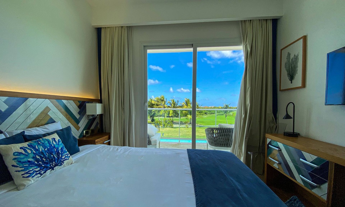 Bavaro Apartment | Awesome 2-Bedroom Apartment with a Pool View & Balcony - Golf Course in Front