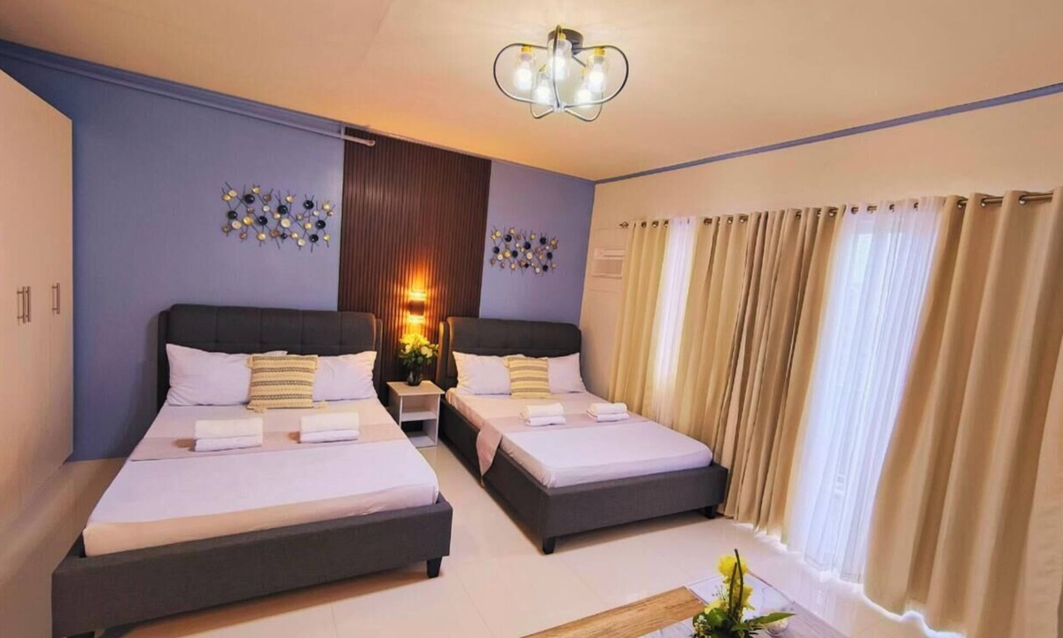 Puerto Princesa City Centre Apartment | B1 7Kunzite - Puerto Princesa Twinbeds Home with a balcony+FREE Pool