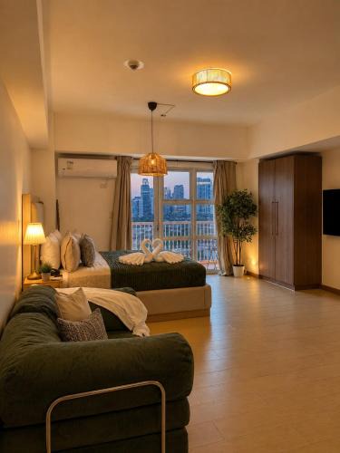 Pinagsama Apartment | Chic & Cozy Studio with Balcony by Venice Canal BGC