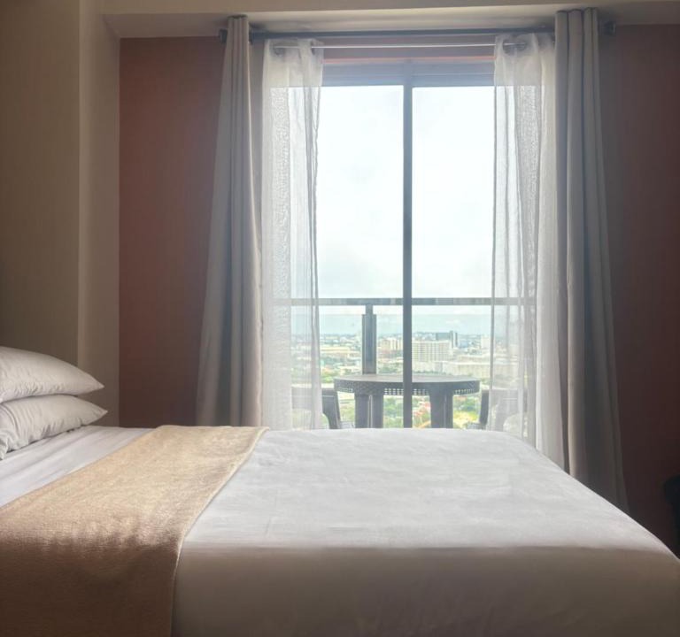 North Reclamation Area Apartment | Condo with Balcony - MIGAs Haven at Sunvida Tower