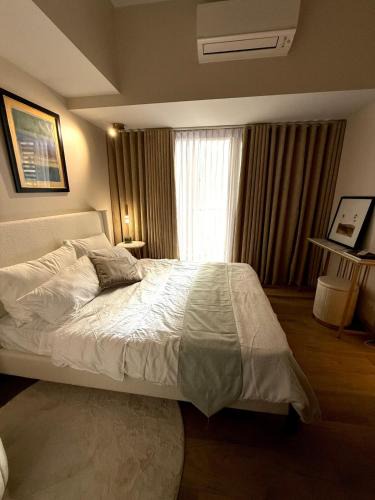 Bonifacio Global City Apartment | Cozy 1BR in BGC at Park Mckinley West Near Airport