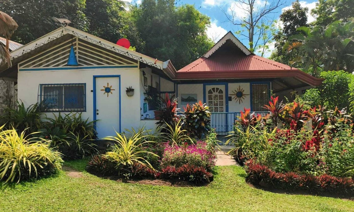 Mambajao House | Cozy 2-bedroom house in welcoming Mambajao with AC