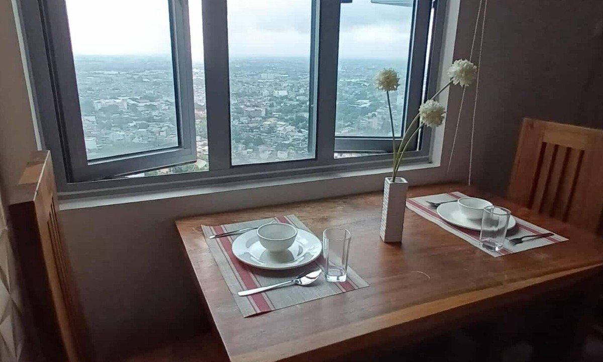 Santo Cristo Condo | Cozy High-Rise Haven