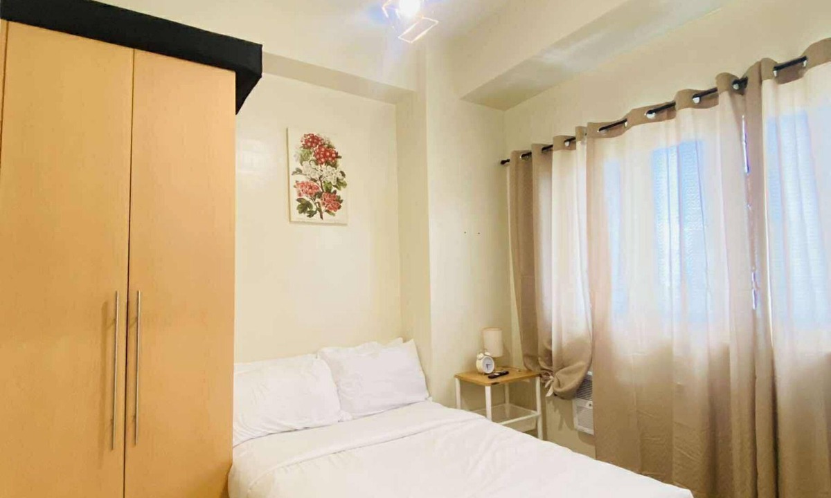 Iloilo Condo | Cozy Iloilo City Condo Room with Shared Pool