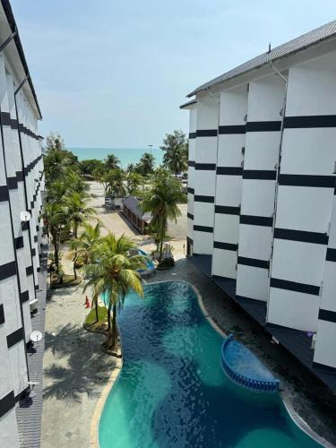 Bagan Pinang Apartment | Golden Straits Villas Beach Resort - Nomad Homestay