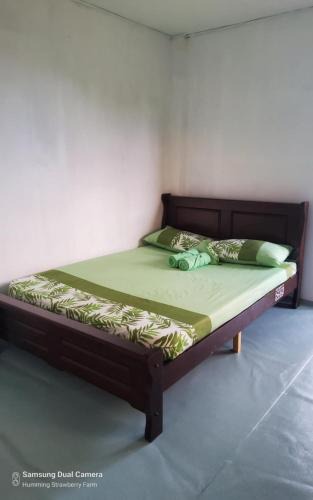 Pulot House | Ground Floor Air-conditioned Room in the Family Hut Bamboo House