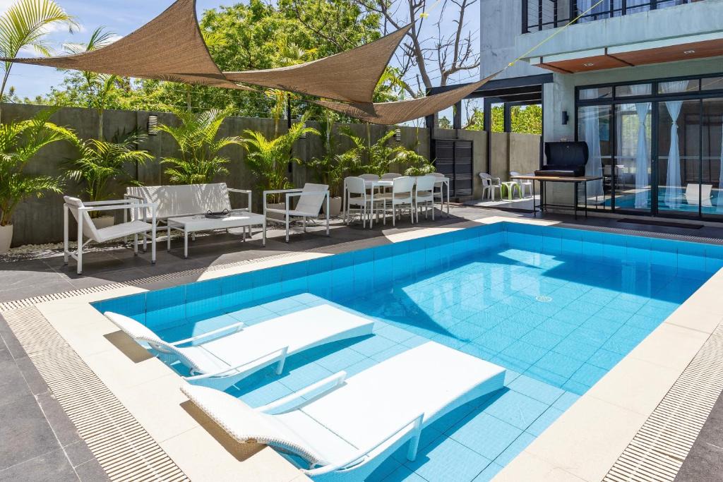 Maribago Villa | ISLA VILLA 2 Luxury Pool Villa near beach with karaoke video games barbecue