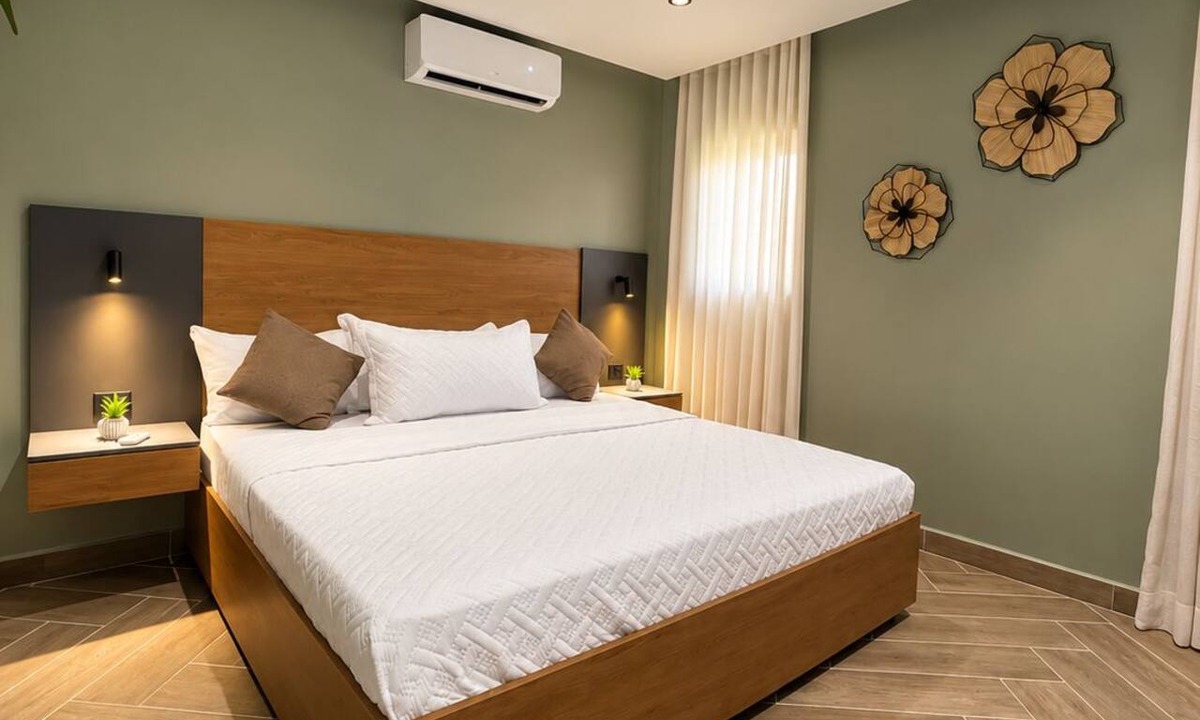 Higuey Apartment | Luxury Minimalist Suite with a Private Living Room and Kitchenette, near the squares.