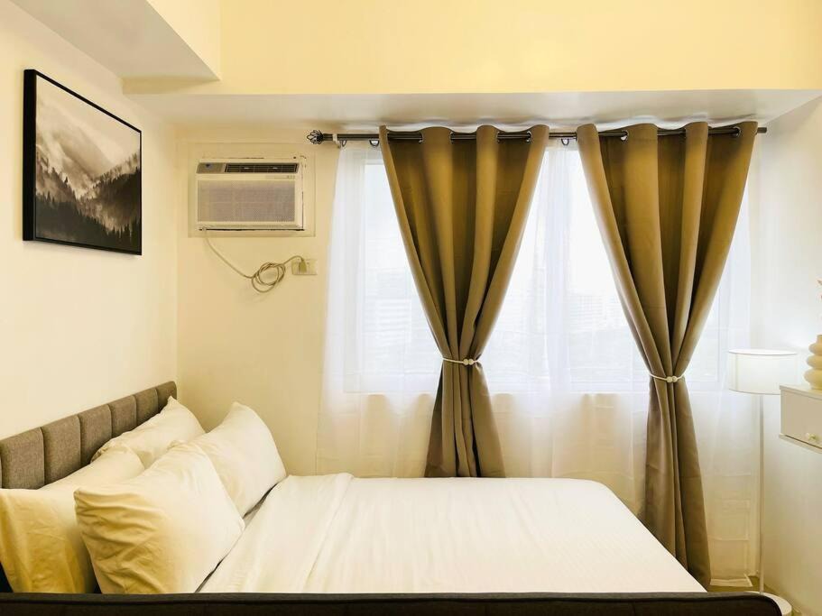 Mandurriao Apartment | R2 Minimalist Snug Haven