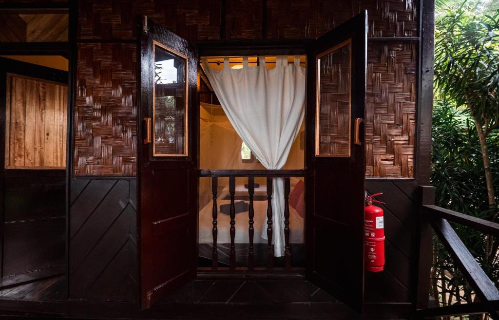 Tekek Hotel | Swiss Cottage Tioman
