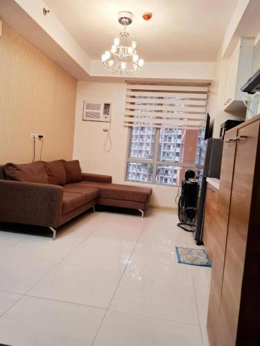 Pasig Apartment | U607 Sunshine100 1bedroom 65InchesTV Wifi Swimming Pool