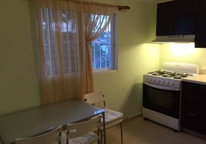 Guest-Friendly 2-bedroom top-floor condo with pool in the center of Sosua in Sosua
