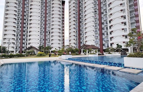 Basak Condo | 1 bedroom condo living room and kitchen sleeps 4 EARLY CHECK IN -LATE CHECK OUT