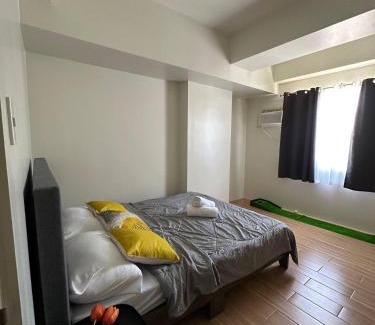 Binan City Apartment | 1Bedroom, living room w balcony ADHI staycation