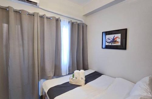 Highway Hills Apartment | 1BR Condotel with Balcony at FAME Residences #FM30
