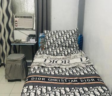 Quezon City House | Budget Staycation JOHNFONZ Building Aircondition Room