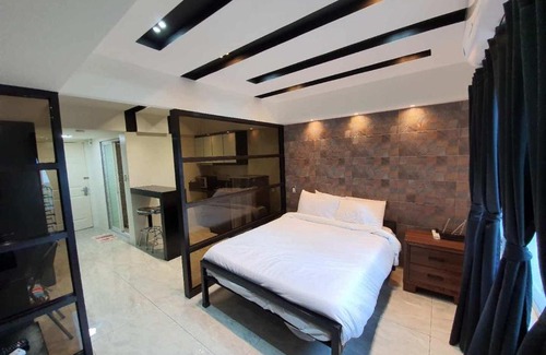 Paranaque Apartment | Burgundy McKinley Place Service Apartment
