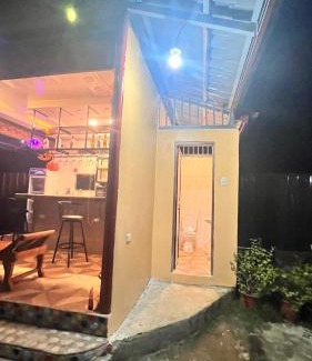 San Pedro House | Casa La Princesa 1 Family Room with cozy balcony & kitchen
