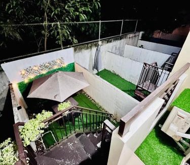Cagayan de Oro Apartment | CK Haven Hot Shower WiFi Smart TV Outdoor Garden
