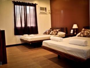 Puerto Princesa City Centre Bed & Breakfast | Cleon Villas Pension