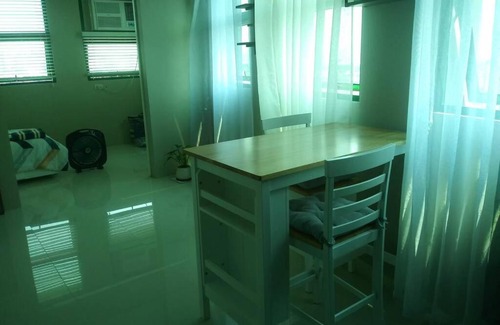 South Triangle Apartment | Cozy and Comfortable living in QC within trendy Timog-T Morato area Please note that minimum stay should be 3 months