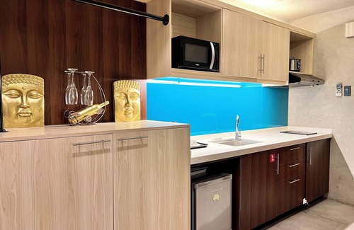 Kaunlaran Condo | Cozy, Comfy & Spacious Hotel Type Condo with FREE Wifi, PS5 & 55" Smart TV