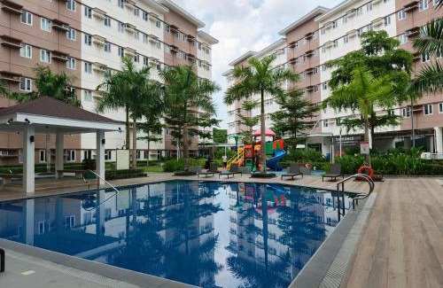 Trece Martires Apartment | Happy Stays E - 300mbps - 65"TV NetFlix, Disney - Washer