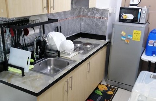 Santo Cristo House | Jocelyn Staycation @Grass Residences North EDSA