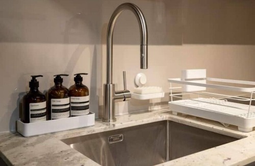 Taguig Condo | Minimalist & New 1BR GetAway with Free Parking