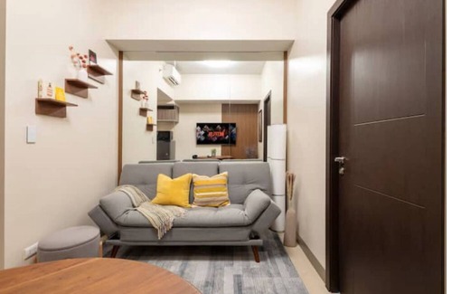 Taguig Condo | Minimalist & New 1BR GetAway with Free Parking