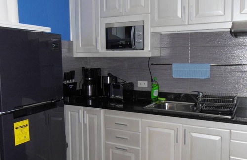 Lapu-Lapu Condo | new Lux. 2BR condo + 2 pools, woow oceanviews, Gym, Beach, behind Mactan Newtown