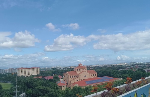 San Dionisio Condo | Pet friendly condo near NAIA with massage chair and pool