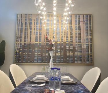 Tambo Apartment | Playful 1BR With Magnificant Bayview Garden View Near Okada Solaire Aiports with Free Parking