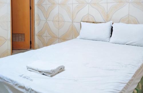 Tagum Hotel | RedDoorz @ PVC Pension Haus
