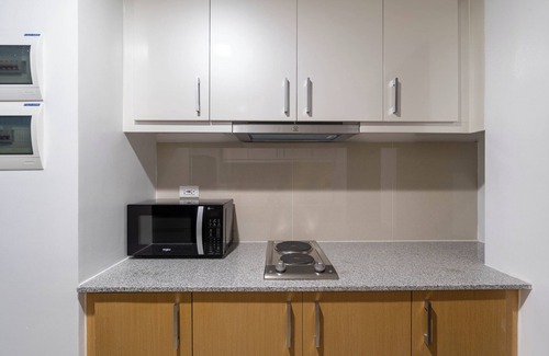 Katuparan Condo | Soothing 1-bedroom condo in lovely BGC Taguig with AC, WiFi FREE Pool use