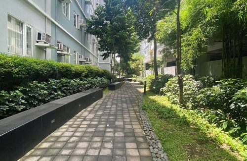 Novaliches Condo | Spacious Comfort: Two bedrooms & large living space ideal for families friends