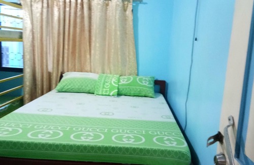 Olongapo House | Yellow HOUSE Vacation Rental