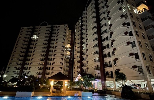 Basak Condo | 1 bedroom condo living room and kitchen sleeps 4 EARLY CHECK IN -LATE CHECK OUT