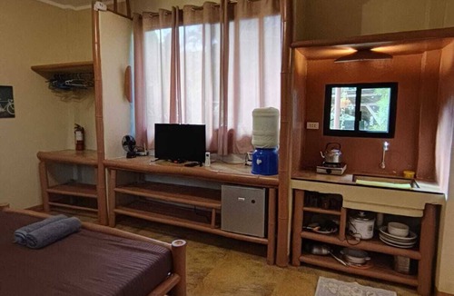 Mambajao House | 1-Bedroom House in Abu Baylao, Mambajao, Camiguin with Starlink WiFi & Cold AC.