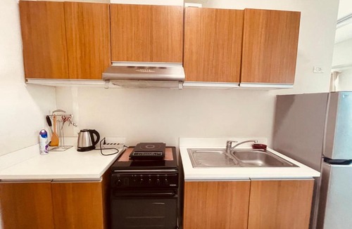 Barangay 670 Apartment | 1BR FAMILY ROOM Condo staycation with 2 Queen size bed in Manila near Robinsons Place mall and SLMEC