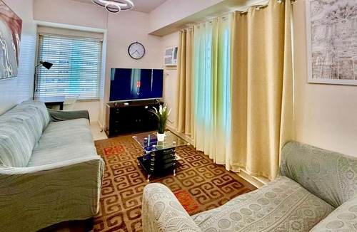 Barangay 670 Apartment | 1BR FAMILY ROOM Condo staycation with 2 Queen size bed in Manila near Robinsons Place mall and SLMEC