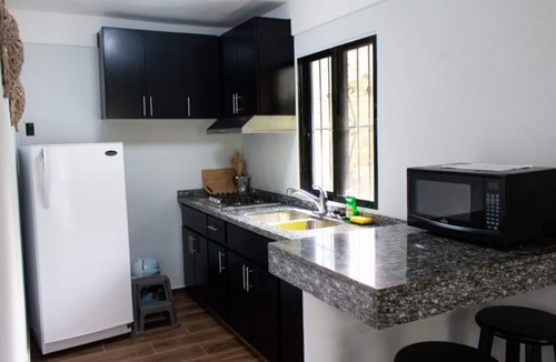 Cabarete Apartment | 2BD condo on a quiet Cabarete surfing beach, good for 8 adults