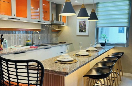 Don Bosco Condo | 2BR Tropical Scandi Suite