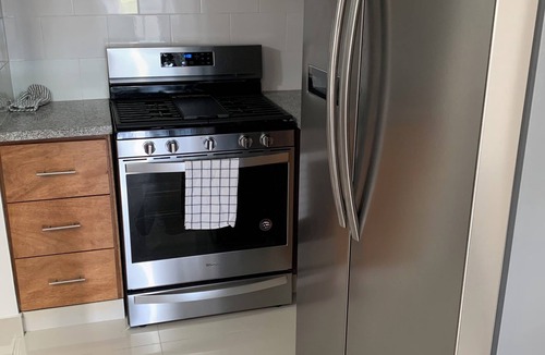 Santo Domingo Condo | 4-bedroom condo Steps from Ocean w/Pier, parking, WiFi, AC, parks & shopping.